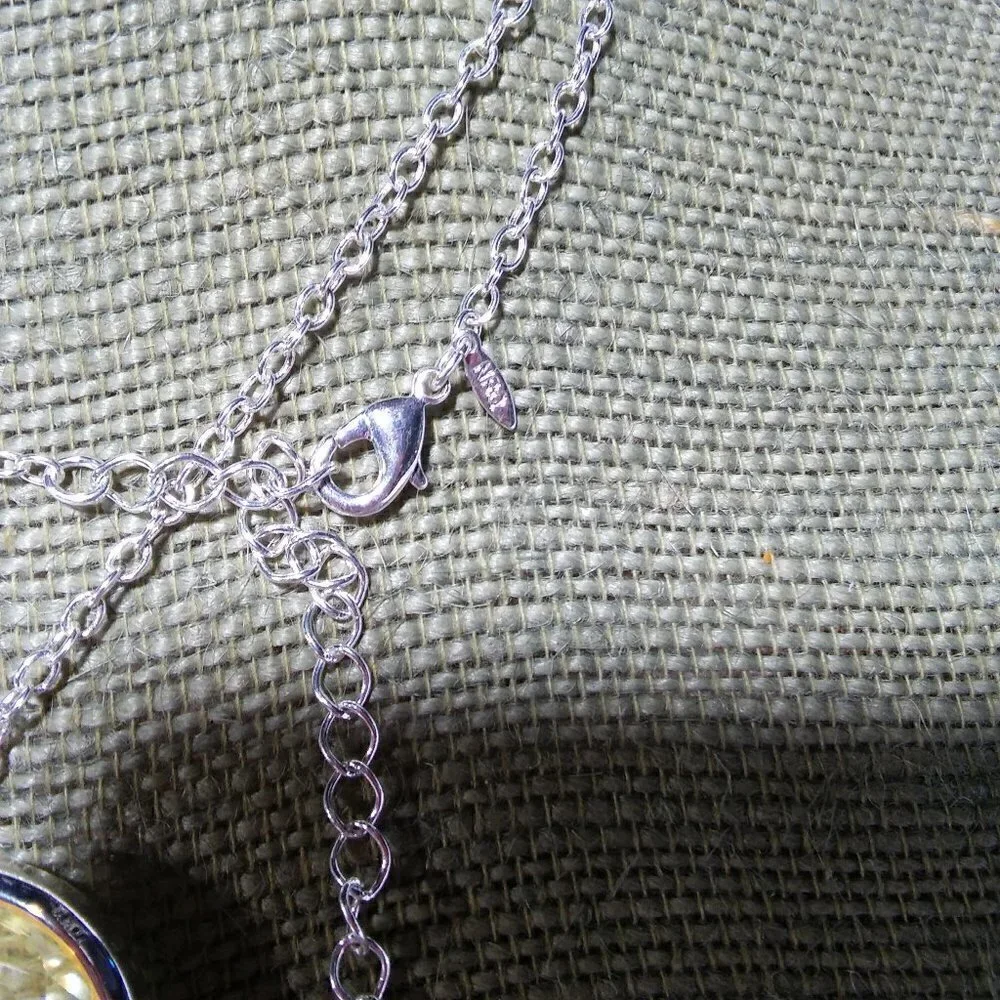 Women`s silver tone charm faceted faith cross neck